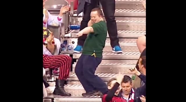 Crowd Cheers on Young Man with Down Syndrome as He Dances at Rugby Game
